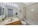 Updated bathroom with a vanity, toilet, and shower/tub combo at 6836 Bay Hill Dr, Bradenton, FL 34202