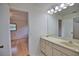 Bathroom with a vanity, sink and mirror at 7171 Wood Creek Dr # 5, Sarasota, FL 34231