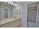 Clean bathroom with vanity, sink, and shower at 7171 Wood Creek Dr # 5, Sarasota, FL 34231