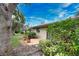 Backyard with patio and landscaping at 7171 Wood Creek Dr # 5, Sarasota, FL 34231