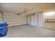 Garage with extra storage and workshop area at 7171 Wood Creek Dr # 5, Sarasota, FL 34231