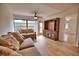 Living room with hardwood floors and sliding glass doors at 7171 Wood Creek Dr # 5, Sarasota, FL 34231
