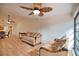 Spacious living room with hardwood floors and natural light at 7171 Wood Creek Dr # 5, Sarasota, FL 34231
