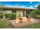 Private patio with landscaping at 7171 Wood Creek Dr # 5, Sarasota, FL 34231