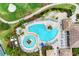 Aerial view of resort-style pool and surrounding amenities at 7208 River Hammock Dr # 103, Bradenton, FL 34212