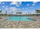 Relaxing community pool with lake view at 7408 Cabin Ln, Sarasota, FL 34240