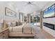 Spacious main bedroom with sliding doors to the pool area at 8059 Royal Birkdale Cir, Lakewood Ranch, FL 34202