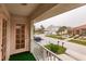 Balcony view of a residential street with manicured lawns and mature trees at 109 Tortuga Dr, Nokomis, FL 34275
