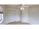 Bedroom with laminate floors, ceiling fan, closet and natural light at 109 Tortuga Dr, Nokomis, FL 34275