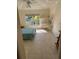 Bedroom with built-in workspace and tile floors at 109 Tortuga Dr, Nokomis, FL 34275