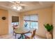 Bright breakfast nook with a cozy dining set and a sunny window view at 109 Tortuga Dr, Nokomis, FL 34275