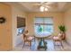 Cozy breakfast nook with decorative table and chairs, plus a sunny window at 109 Tortuga Dr, Nokomis, FL 34275