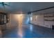 Spacious two car garage with storage space and access door at 109 Tortuga Dr, Nokomis, FL 34275