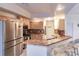 Kitchen with stainless steel appliances and breakfast bar at 109 Tortuga Dr, Nokomis, FL 34275