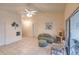 Spacious living area with tiled floors and neutral decor, perfect for relaxation and entertaining at 109 Tortuga Dr, Nokomis, FL 34275