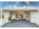 Inviting screened porch with sliding glass doors at 109 Tortuga Dr, Nokomis, FL 34275