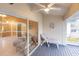 Relaxing screened porch with a lounger and sliding glass doors at 109 Tortuga Dr, Nokomis, FL 34275