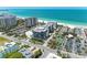 Aerial view highlighting condo's beach proximity and surrounding area at 1102 Benjamin Franklin Dr # 407, Sarasota, FL 34236