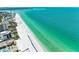 Aerial view of beach and ocean, showing white sand and turquoise water at 1102 Benjamin Franklin Dr # 407, Sarasota, FL 34236