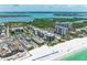 Aerial view showing building's beach proximity at 1102 Benjamin Franklin Dr # 407, Sarasota, FL 34236