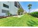 Well-manicured green lawn featuring a shuffleboard court at 1102 Benjamin Franklin Dr # 407, Sarasota, FL 34236