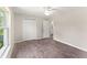 Bedroom with double door closet and ensuite bathroom at 12098 Brookside Ave, Port Charlotte, FL 33981