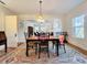 Bright dining room with hardwood floors and a view of the living room at 1420 22Nd W St, Bradenton, FL 34205