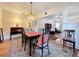 Charming dining area with hardwood floors and view into living room at 1420 22Nd W St, Bradenton, FL 34205