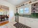 Kitchen with stainless steel appliances and ample cabinet space at 1420 22Nd W St, Bradenton, FL 34205