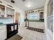 Efficient kitchen, featuring stainless steel appliances and a view to dining area at 1420 22Nd W St, Bradenton, FL 34205