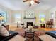 Spacious living room with hardwood floors, fireplace, and comfortable seating at 1420 22Nd W St, Bradenton, FL 34205