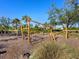 playground with wooden climbing structures at 15317 Isla Palma Ln, Nokomis, FL 34275