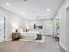 Spacious bedroom with a king-size bed and light wood floors at 1621 Pine Bay Dr, Sarasota, FL 34231