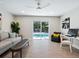 Relaxing home office space with pool access and plenty of natural light at 1621 Pine Bay Dr, Sarasota, FL 34231