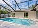 Inviting screened pool with ample deck space at 1621 Pine Bay Dr, Sarasota, FL 34231
