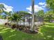 Screened-in pool area with plenty of space for relaxation at 1621 Pine Bay Dr, Sarasota, FL 34231