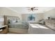 Spacious bedroom with large window and plush carpeting at 17923 Polo Trl, Bradenton, FL 34211