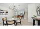 Elegant dining area showcasing a glass-top table and stylish chairs at 17923 Polo Trl, Bradenton, FL 34211