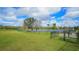 Dog park with lake views and shaded seating at 17923 Polo Trl, Bradenton, FL 34211