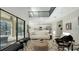 Living room with high ceilings and view of kitchen and pool at 17923 Polo Trl, Bradenton, FL 34211