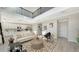 Bright living room with high ceilings, fireplace, and pool view at 17923 Polo Trl, Bradenton, FL 34211