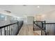 Spacious loft area overlooking the main living space at 17923 Polo Trl, Bradenton, FL 34211