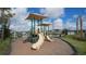 playground with shaded play structures at 17923 Polo Trl, Bradenton, FL 34211