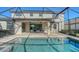 Inviting screened-in pool and spa, ample patio space at 17923 Polo Trl, Bradenton, FL 34211