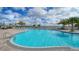Relaxing community pool with a spacious deck at 17923 Polo Trl, Bradenton, FL 34211