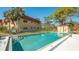 Community pool with surrounding patio at 209 Rubens Dr # F, Nokomis, FL 34275