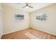 Spacious bedroom with two windows and hardwood floors at 2101 25Th W Ave, Bradenton, FL 34205