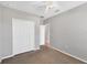 Bedroom with double door closet and carpet at 2179 W Price Blvd, North Port, FL 34286