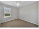 Bright bedroom with carpet and ceiling fan at 2179 W Price Blvd, North Port, FL 34286