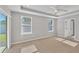 Spacious bedroom with carpet, window, and ceiling fan at 2179 W Price Blvd, North Port, FL 34286